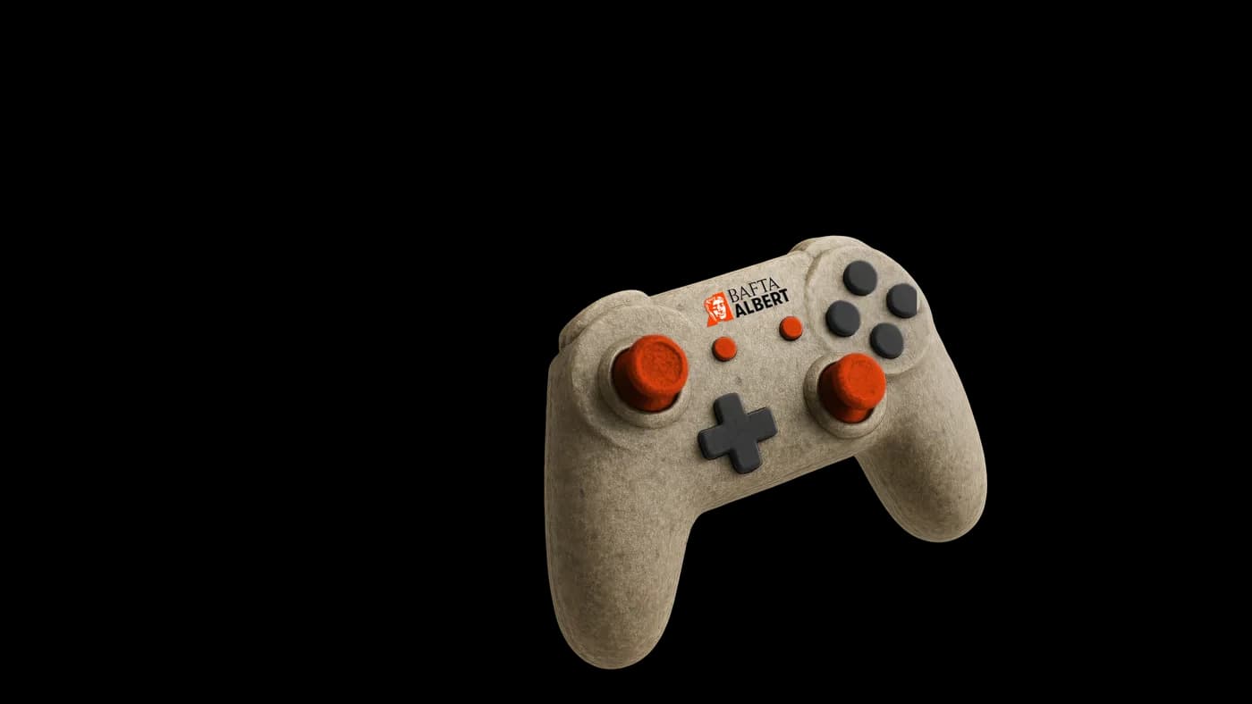 Felt games controller with a BAFTA albert sticker